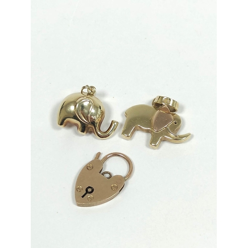 76 - 9ct gold padlock and two charms. 7g