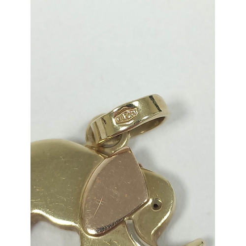 76 - 9ct gold padlock and two charms. 7g