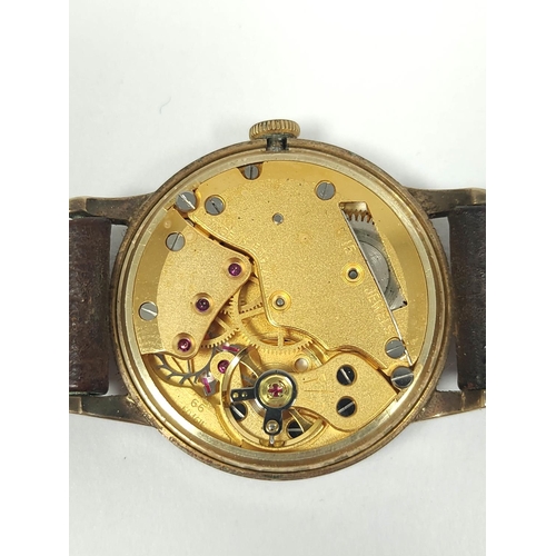 82 - Smiths de Luxe 9ct gold watch inscribed and dated 'British Railways W L Wright' on strap 1962. 31mm.