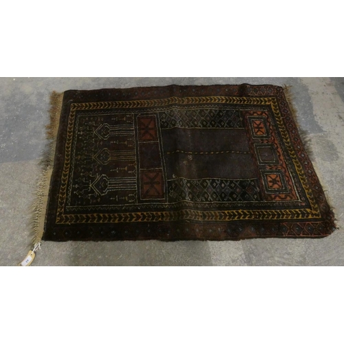 24 - Small Eastern rug.