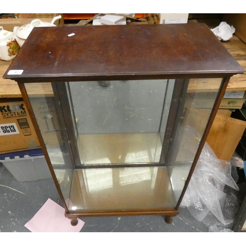 87 - Mirror back glazed display cabinet.