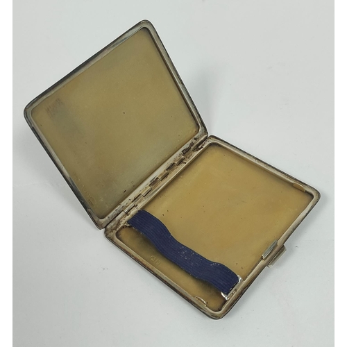 12 - Silver scallop caddy spoon, Britannia Standard, Birmingham 1911, a vesta case and a cigarette case, ... 