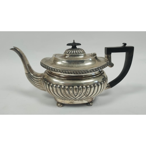 21 - Silver three piece tea set of fluted boat shape by Sheffield 1904. 1190g./38oz approx.