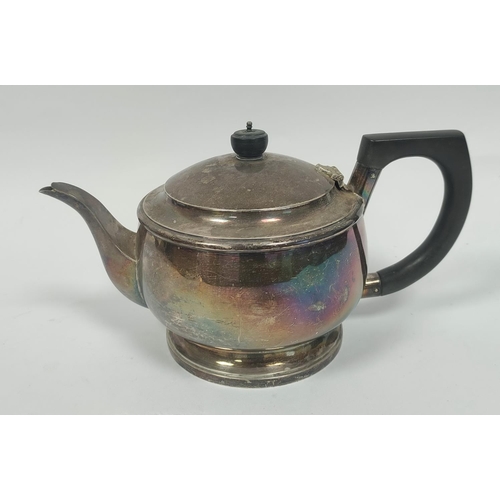 26 - Silver tea pot of plain compressed spherical shape by Reid & Sons 1935, 688 grams.