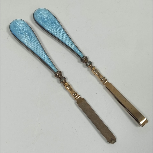 79 - Silver hairbrush and mirror with guilloche enamel, 1936 and a similar manicure set, both cased.