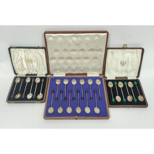 8 - Two sets of six silver coffee spoons with bean ends and another twelve, cased. 