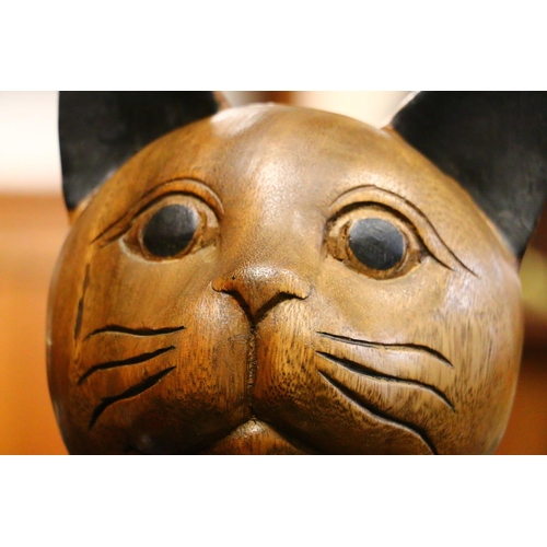 17 - Large treen model of a seated cat, 64cm.