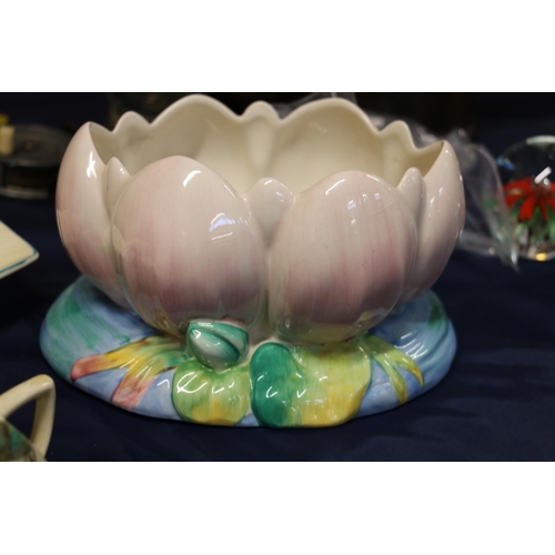 34 - Clarice Cliff Lotus bowl, Clarice Cliff cabinet trio, and similar ceramics.