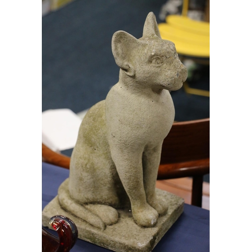 78 - Stone model of a cat on plinth base.