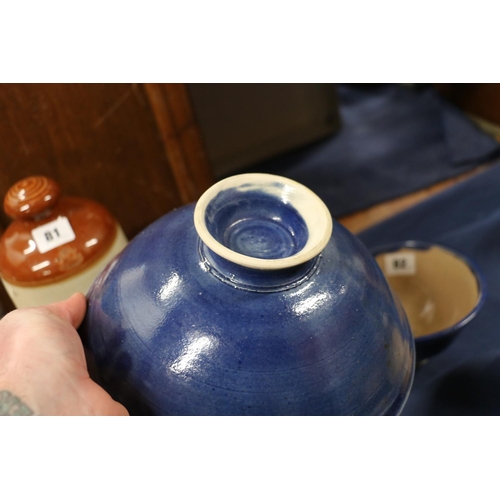 82 - Studio Pottery blue glazed footed bowl, and four smaller matching bowls.  (5)