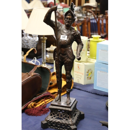 97 - Cast metal model of a knight holding a spear, 72cm high.