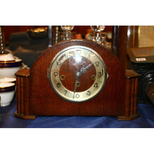 128 - Oak cased mantel clock.