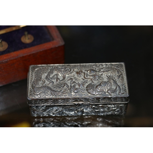 11 - Sykes hydrometer in fitted case, and a dragon decorated oriental hinge top trinket box.  (2)