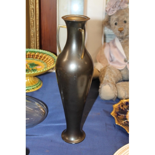 46 - Bronzed tri-handled vase, 31cm high.