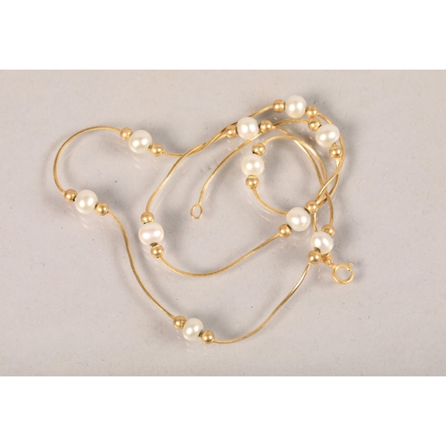 67 - 9 carat yellow gold and pearl set necklace