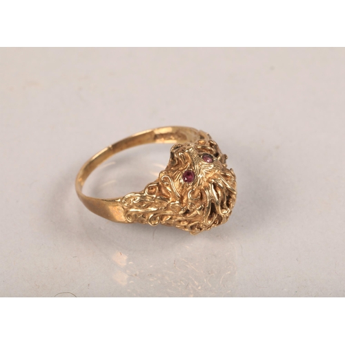 71 - 9 carat yellow gold and ruby set 'bears head' ring; ring size S; 5.5g gross weight