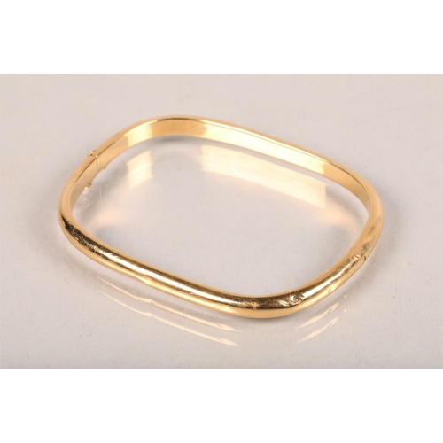 77 - 18 carat yellow gold ladies hinged bangle; 10.5g gross weight