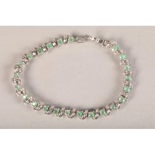 83 - silver mounted and pale green stone ladies bracelet; 18.5cm long