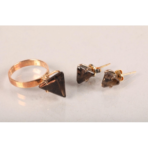 93 - Suite of 14 carat yellow gold and smokey quartz mounted jewellery; a ring and a pair of matching ear... 