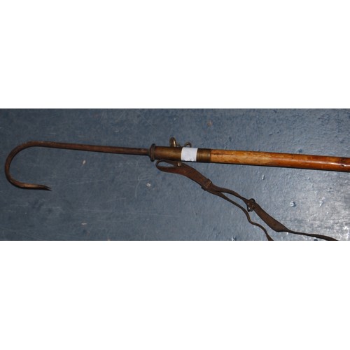 197 - Fishing interest: Hardy Bros fishing gaff with brass mounts and carry strap, a Hardy Bros bamboo rod... 