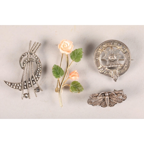 102 - Three silver and white metal brooches; together with a porcelain and metal floral spray brooch (4)