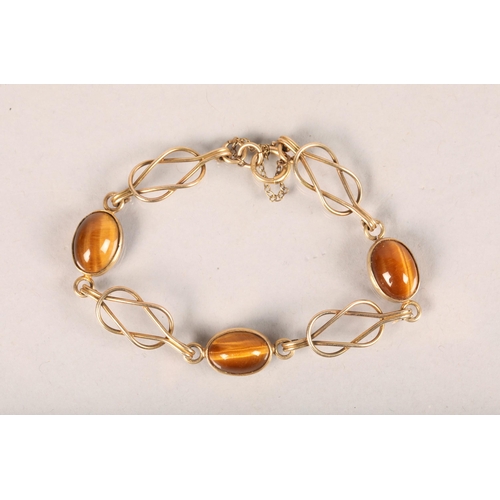 107 - 9 carat yellow gold and tigers eye set ladies bracelet; 12.4g gross weight