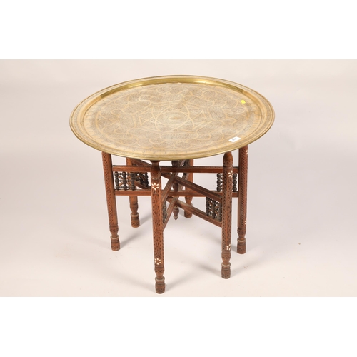 516 - Brass table on turned legs