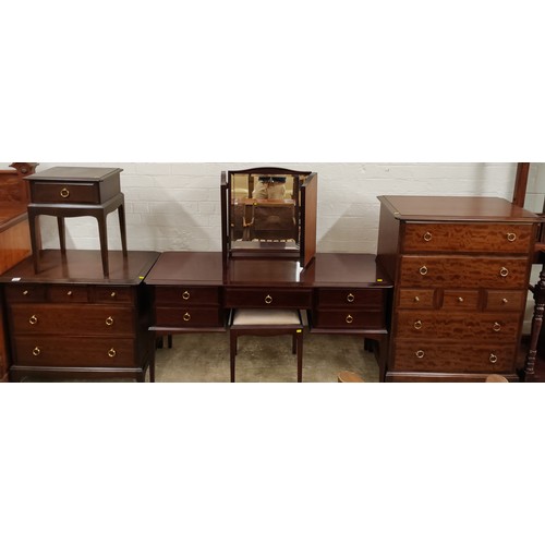 495 - Four Stag bedroom suite comprising Dressing table and mirror, bedside table, three over two chest of... 