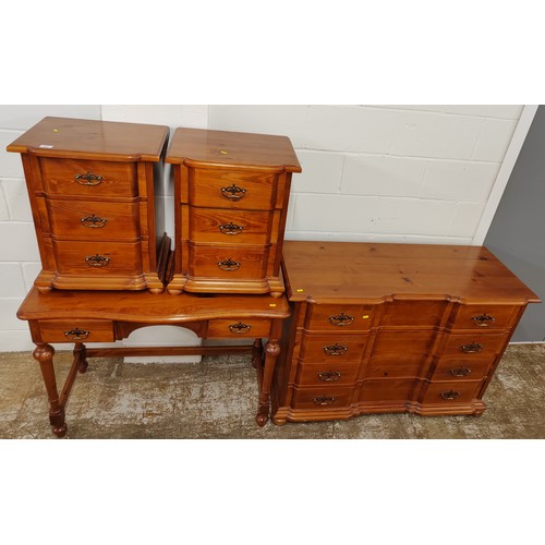 506 - Four piece pine bedroom suite comprising dressing table, set of drawers, two bed side cabinets