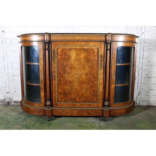 584 - Late 19th century figured walnut credenza, the bow front cabinet with large door to the centre, flan... 