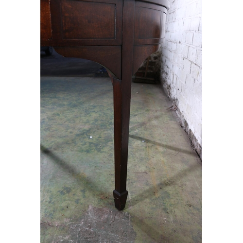 590 - Antique mahogany drum dining table, the circular top above frieze with four drawers, raised on squar... 