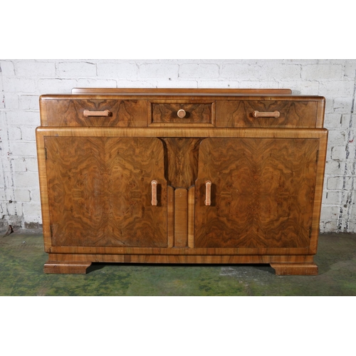 591 - Art Deco style walnut sideboard, the rectangular top with moulded edge above three frieze drawers ov... 