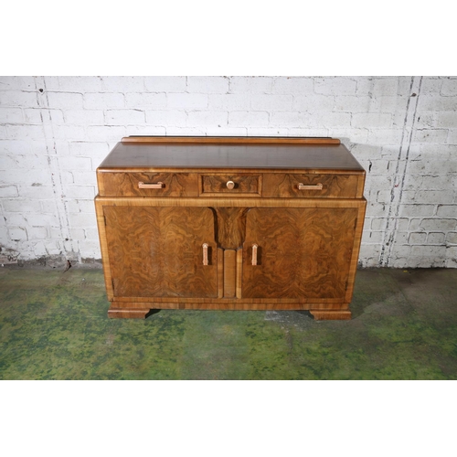 591 - Art Deco style walnut sideboard, the rectangular top with moulded edge above three frieze drawers ov... 