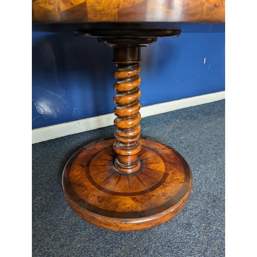 594 - A modern centre table with circular parquetry top with bass edge on barley twist support on circular... 