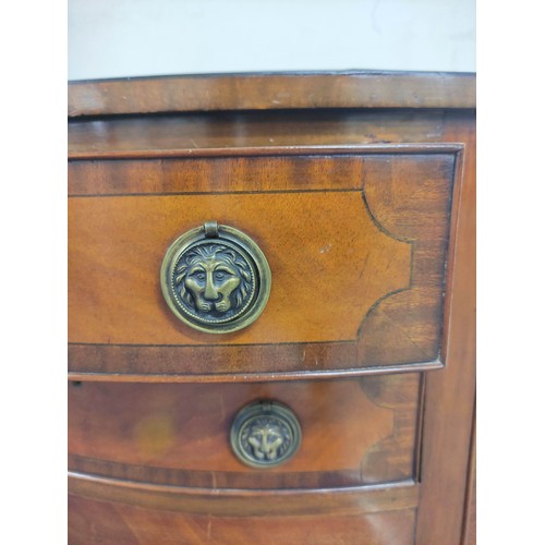 601 - Edwardian mahogany and ebony strung bowfront sideboard, with two drawers to the centre, flanked with... 