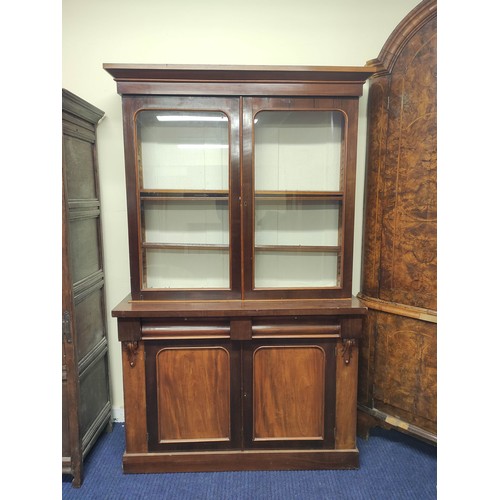 612 - Late 19th century mahogany and beech cabinet bookcase, the glazed upper section above lower section ... 