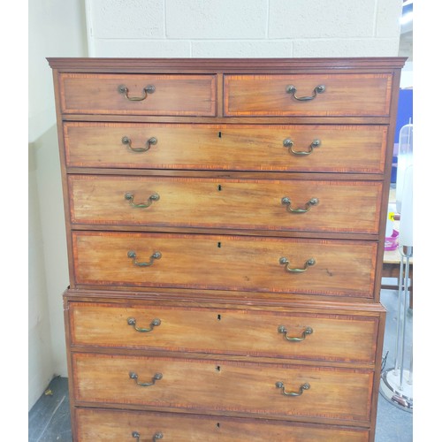 614 - Late 19th century crossbanded mahogany chest on chest, two short drawers above six graduated drawers... 