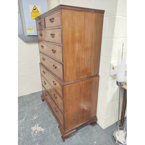 614 - Late 19th century crossbanded mahogany chest on chest, two short drawers above six graduated drawers... 