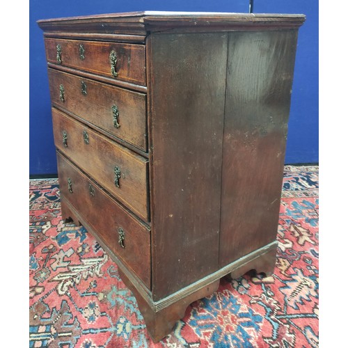 618 - 18th century oak chest of four graduated drawers, moulded edge top and drop handles on bracket feet,... 