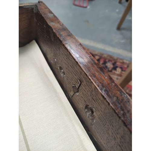 618 - 18th century oak chest of four graduated drawers, moulded edge top and drop handles on bracket feet,... 