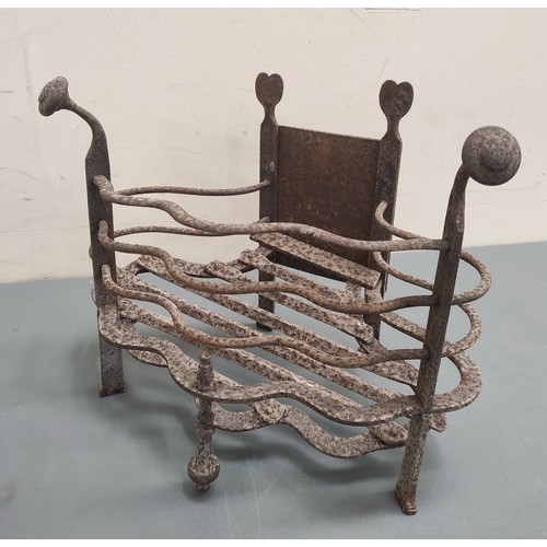 623 - Antique wrought metal fire basket with wavy rail edge, 46cm wide.