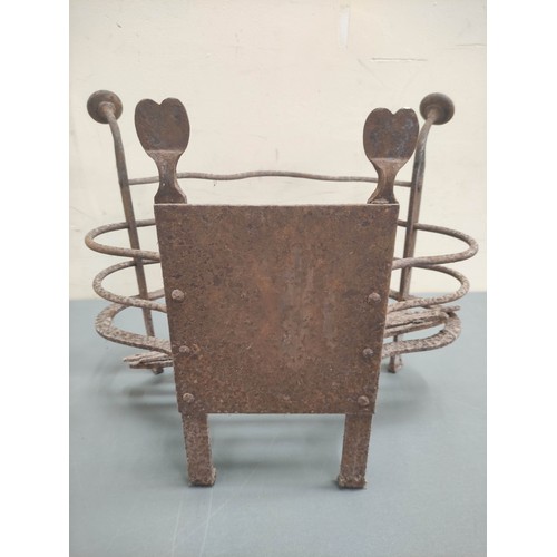 623 - Antique wrought metal fire basket with wavy rail edge, 46cm wide.