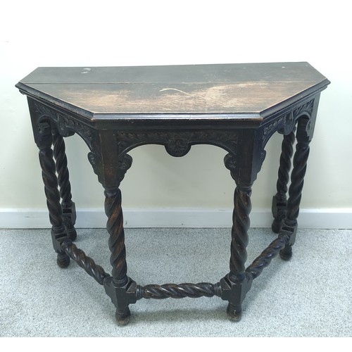 630 - Late Victorian oak hall table, the top of forward tapering form above carved frieze and spiral twist... 