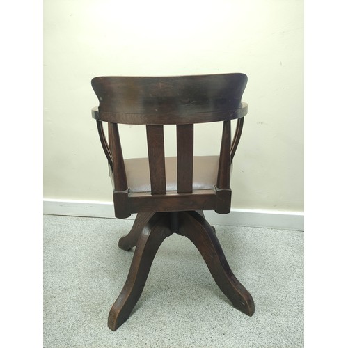 638 - Mid 20th century bow back revolving office chair with vertical splats and slip in seat on quatreform... 