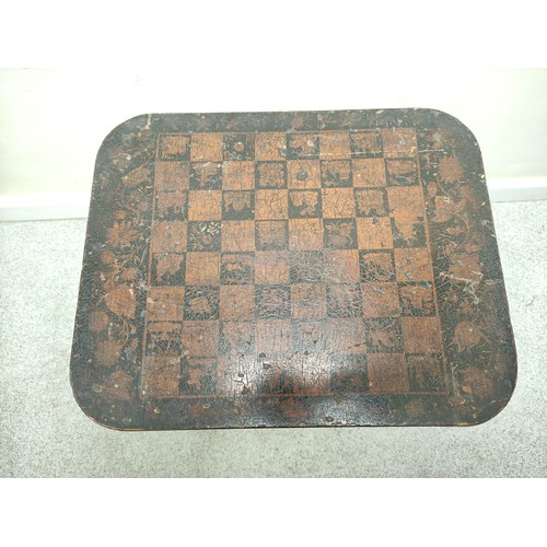 639 - 19th century painted lacquer games table with chess board top on turned tapering column and quatrefo... 