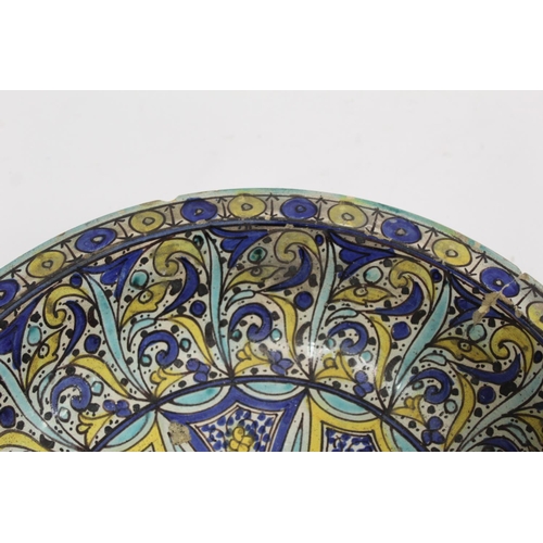 258 - 19th century Islamic tin glazed earthenware bowl, probably Moroccan, decorated in blue, turquoise an... 