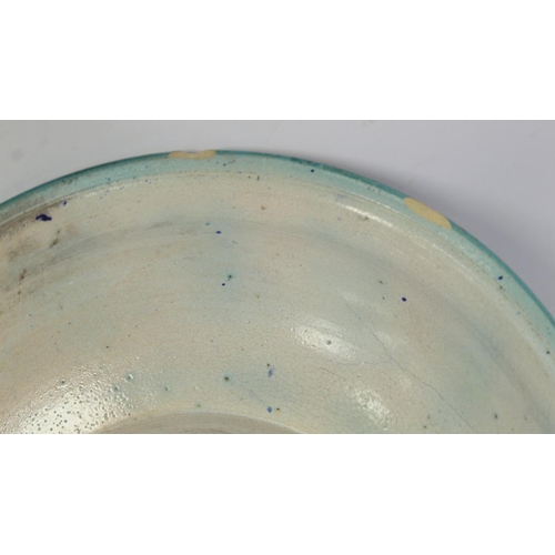 258 - 19th century Islamic tin glazed earthenware bowl, probably Moroccan, decorated in blue, turquoise an... 