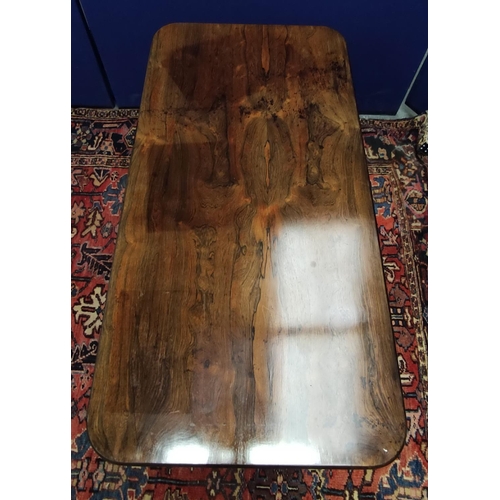 647 - Early Victorian rosewood library table, the rectangular top with curved corners on pair of octagonal... 