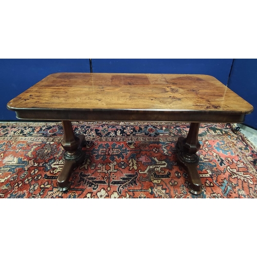 647 - Early Victorian rosewood library table, the rectangular top with curved corners on pair of octagonal... 