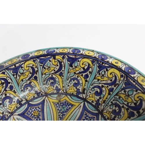 258 - 19th century Islamic tin glazed earthenware bowl, probably Moroccan, decorated in blue, turquoise an... 